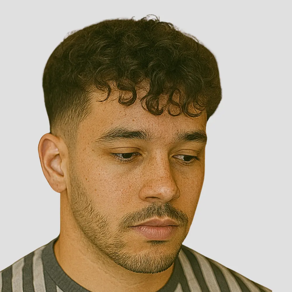 Low Taper Fade with Curly Fringe